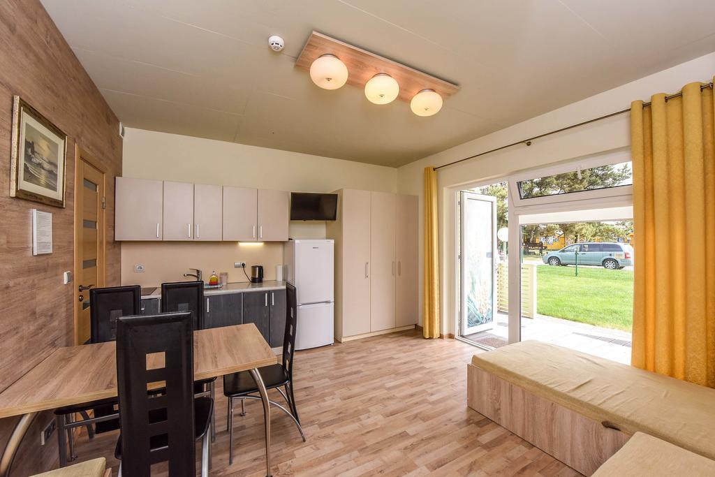 Apartamentai Trys Pusys ซเวนตายิ ภายนอก รูปภาพ