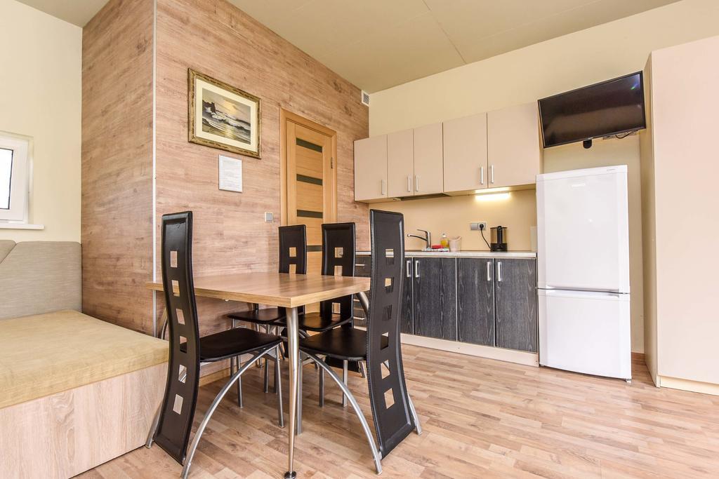 Apartamentai Trys Pusys ซเวนตายิ ภายนอก รูปภาพ