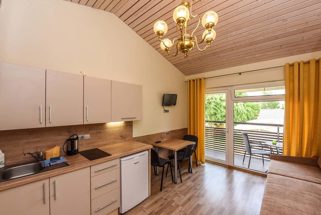 Apartamentai Trys Pusys ซเวนตายิ ภายนอก รูปภาพ